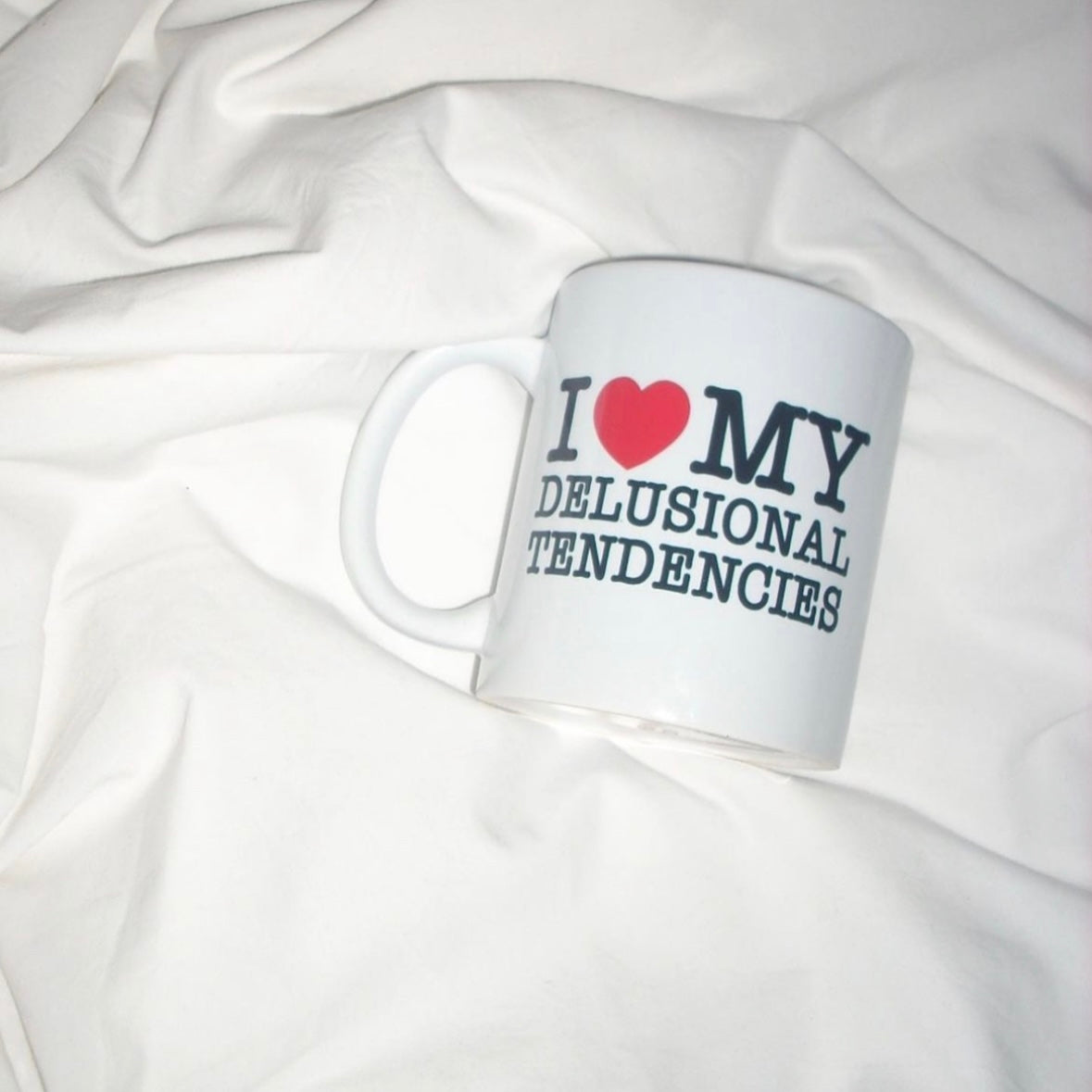 delusional – mug