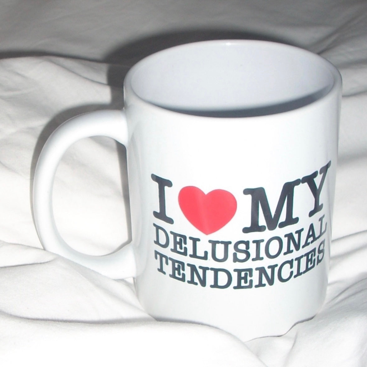 delusional – mug